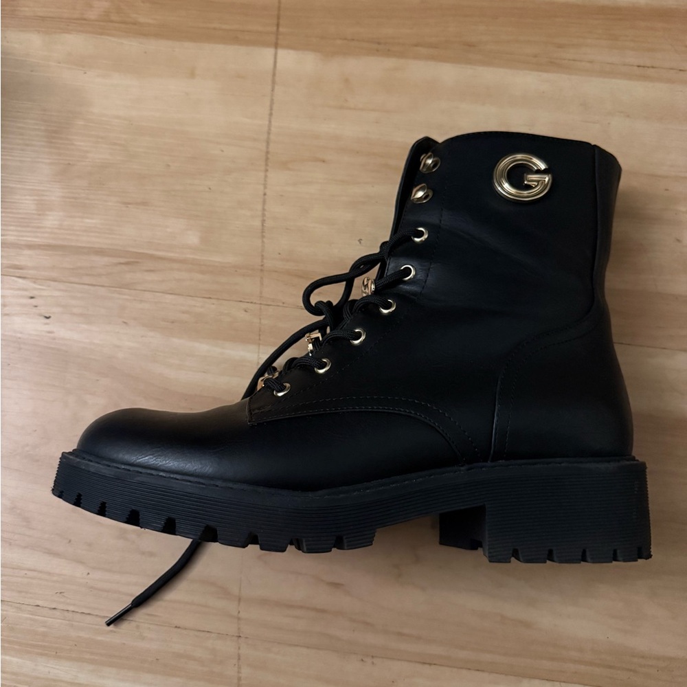 Stylish Black Combat Boots with Gold Accent
